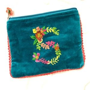 Never Used. Anthropologie cute velvet makeup bag! Monogrammed with ‘S’